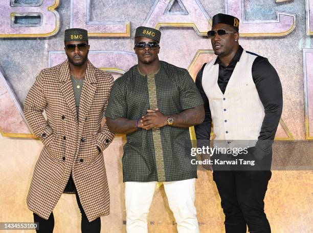 Dele Akinfenwa, Adebayo Akinfenwa and Sham Akinz attend the UK Premiere of "Black Adam" at Cineworld Leicester Square on October 18, 2022 in London,...