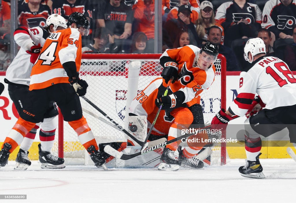 Devils Flyers Nick Seeler and Egor Zamula of the Philadelphia Flyers clear the puck ...