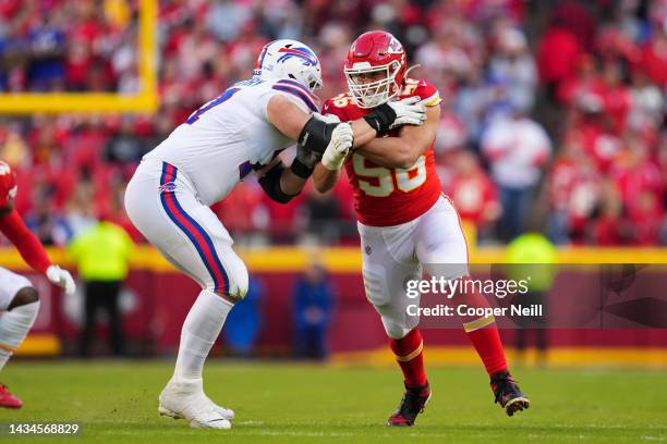 George Karlaftis of the Kansas City Chiefs battles with David Quessenberry of the Buffalo Bills at GEHA Field at Arrowhead Stadium on October 16,...