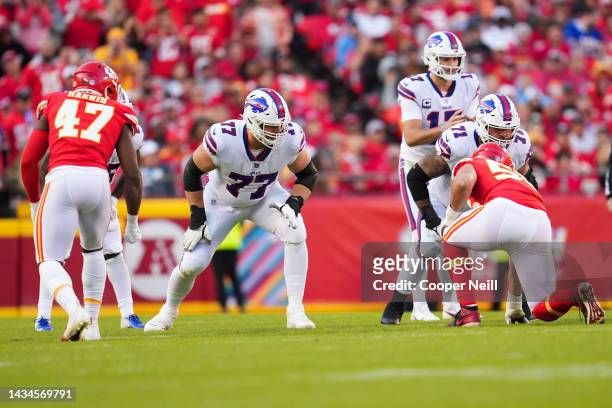 David Quessenberry of the Buffalo Bills and Ryan Bates get set against the Kansas City Chiefs at GEHA Field at Arrowhead Stadium on October 16, 2022...