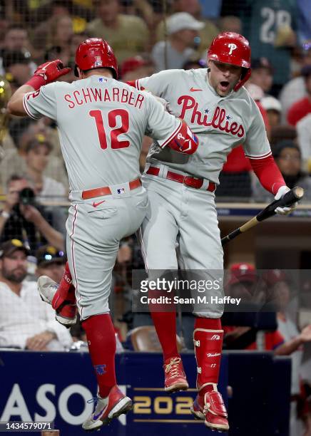 Kyle Schwarber of the Philadelphia Phillies celebrates with Rhys Hoskins after hitting a home run during the sixth inning against the San Diego...