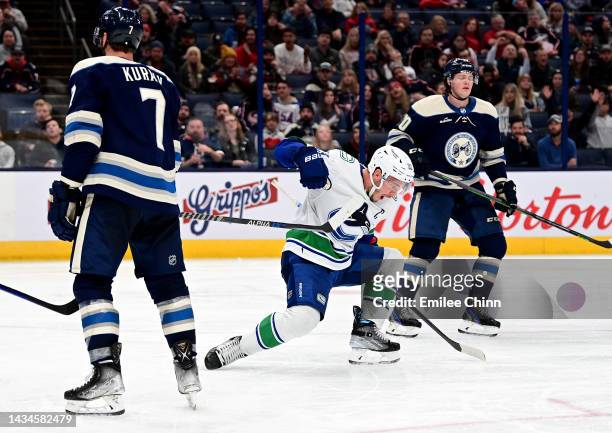 Bo Horvat of the Vancouver Canucks celebrates his goal in the third period against the Columbus Blue Jackets at Nationwide Arena on October 18, 2022...
