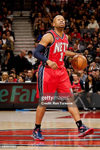 Sundiata Gaines of the New Jersey Nets directs his teammates against the Toronto Raptors on April 26, 2012 at the Air Canada Centre in Toronto,...