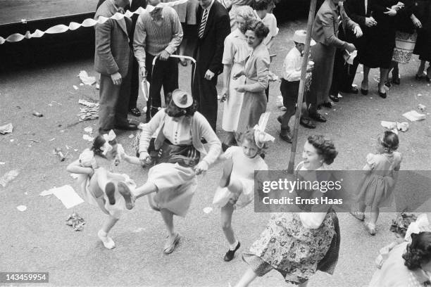 Londoners hold a street party to celebrate the coronation of Queen Elizabeth II, June 1953.