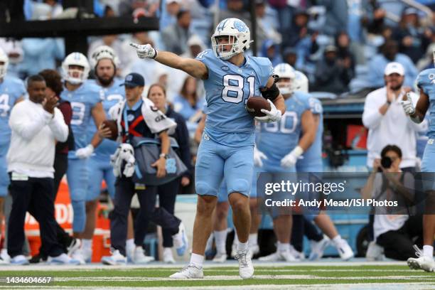 John Copenhaver of the University North Carolina indicates a first down for his team after his 29 yard reception during a game between Virginia Tech...