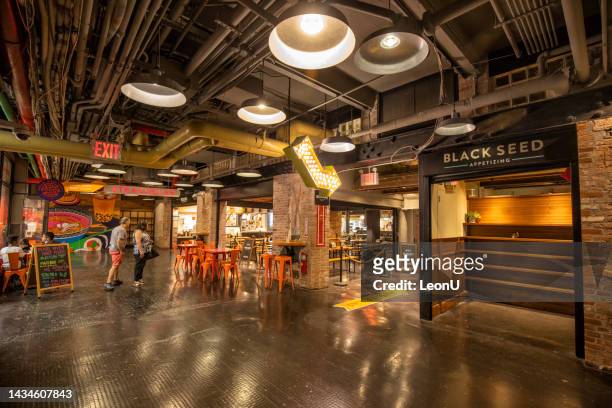 chelsea market in new york city - shop sign stock pictures, royalty-free photos & images