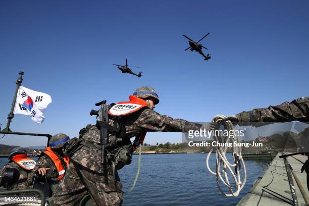 South Korean soldiers participate in a river crossing exercise with U.S. Soldiers on October 19, 2022 in Yeoju, South Korea. North Korea's military...