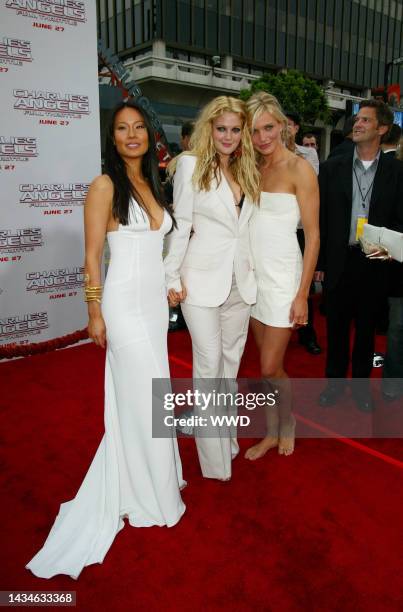 Actresses Lucy Liu, Drew Barrymore and Cameron Diaz attend the premiere of Charlie's Angels: Full Throttle in Los Angeles.