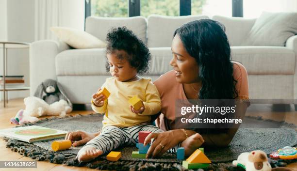 learning, toys and mother with baby in living room and relax together for creative, happy and education games. love, support and playing in family home with child and mom for lifestyle or development - family time stock pictures, royalty-free photos & images