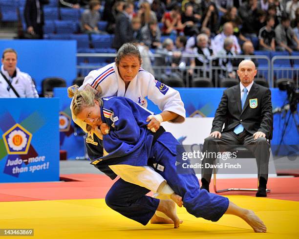 Kerstin Thiele of Germany defeats Marie Pasquet of France during the eliminations on day 2 of the European Championships u70 kg womens contest, at...