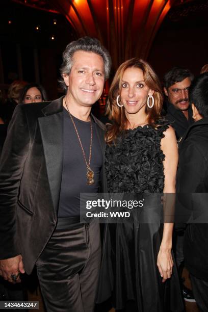 Carlos Souza and Dori Cooperman attend Valentino's The Last Emperor DVD party at The Standard.