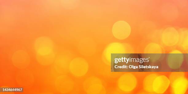 orange abstract background with defocused lights - oranje achtergrond stockfoto's en -beelden