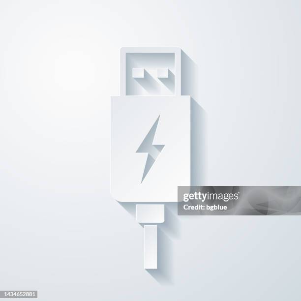 usb charging plug. icon with paper cut effect on blank background - plug adapter stock illustrations