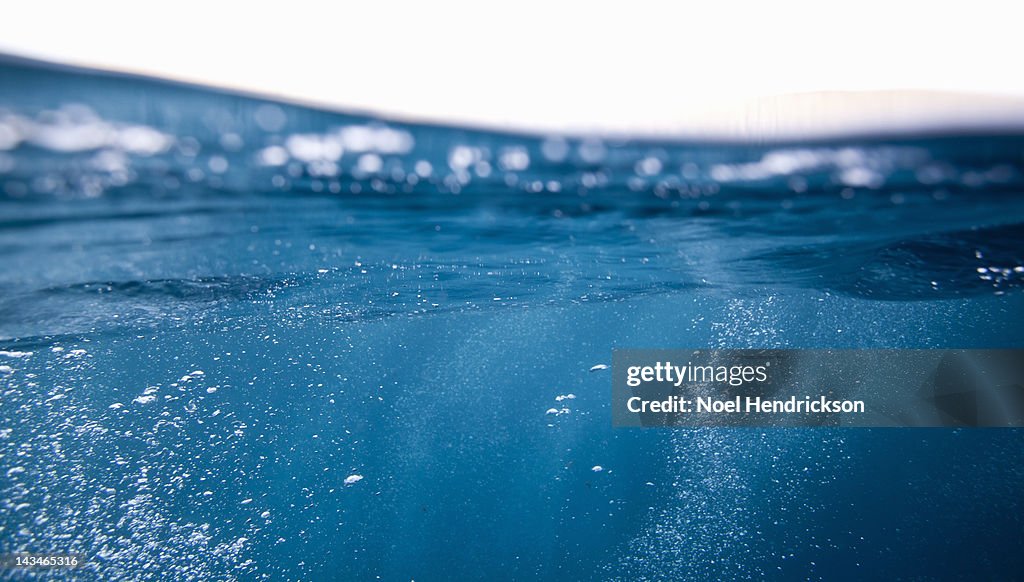 A view of water at the edge of the surface