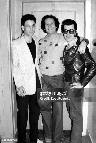 American producer Richard Gottherer poses with American Rockabilly musicians Robert Gordon and Link Wray backstage, Hackensack, New Jersey, March 16,...