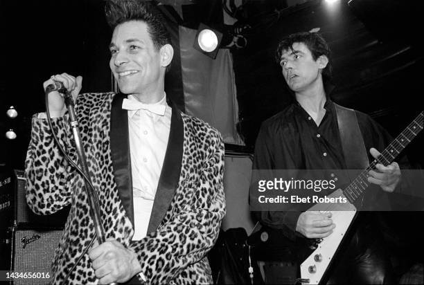 American Rockabilly musicians Robert Gordon and Chris Spedding, on guitar, perform onstage at the Lone Star Cafe, New York, New York, February 14,...