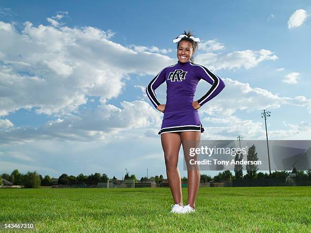 cheerleader on the field - black cheerleaders stock pictures, royalty-free photos & images