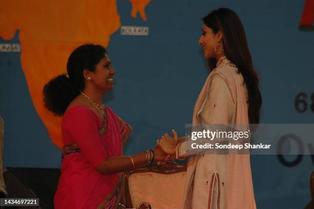 Shilpa Shetty with Asha Ramaiah, National Advocacy Officer at the closing function of the NACOPCI Walk for Life to mark World Aids Day in New Delhi.