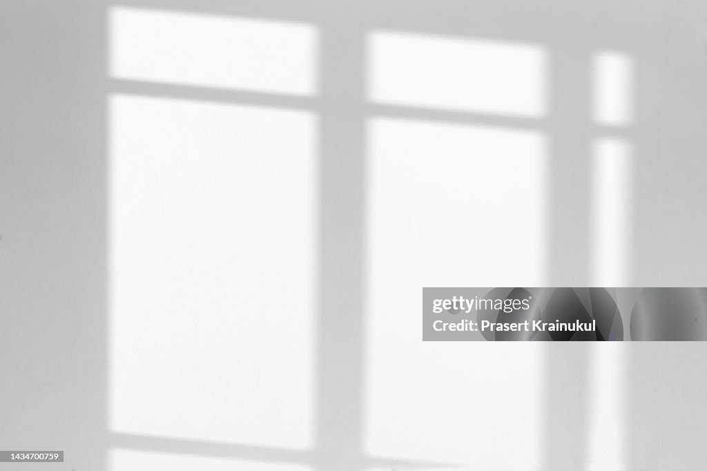 Shadow on gray concrete walls.