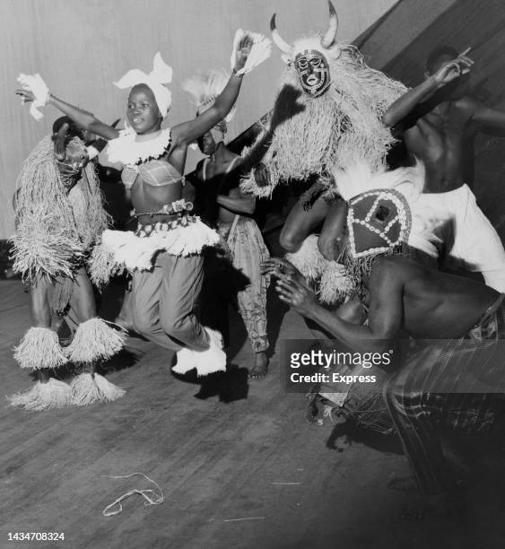 Africa dancers on stage during the First Night performance by Les Ballets Africains, staged at the Palace Theatre in London, England, March 1953. The...
