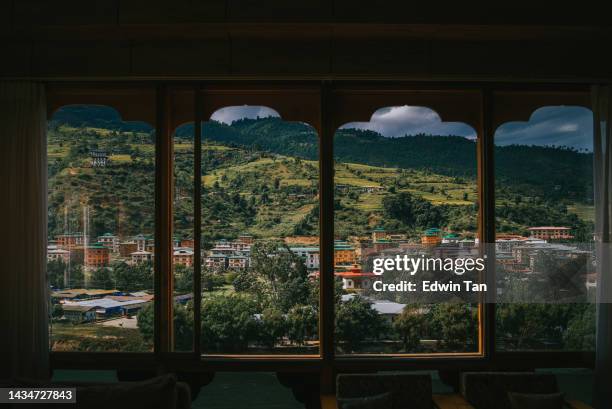 looking through window bhutan thimphu padi field and villages - thimphu 個照片及圖片檔