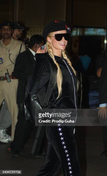 Paris Hilton is seen at Mumbai International airport on October 19, 2022 in Mumbai, India.