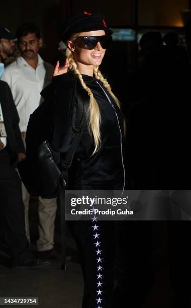 Paris Hilton is seen at Mumbai International airport on October 19, 2022 in Mumbai, India.