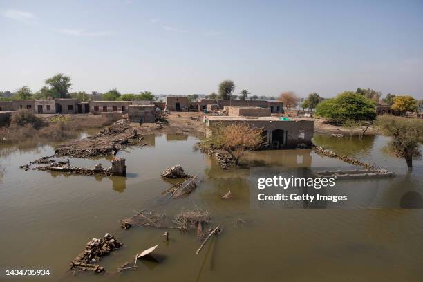 Flooded village is seen from above on October 19, 2022 in Khairpur Nathan Shah, Pakistan. Nearly one-third of Pakistan was deeply affected by...