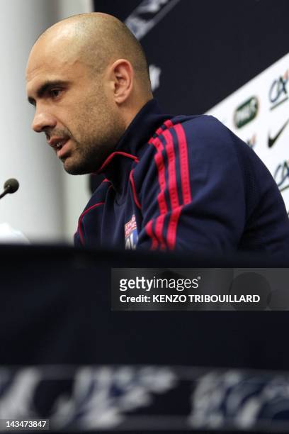 Lyon's Brazilian defender Cris speaks during a press conference on April 27, 2012 at the Stade de France in Saint-Denis, outside Paris, on the eve of...