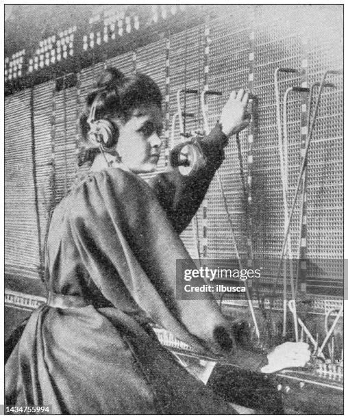 antique image: telephone switchboard operator - switchboard operator stock illustrations