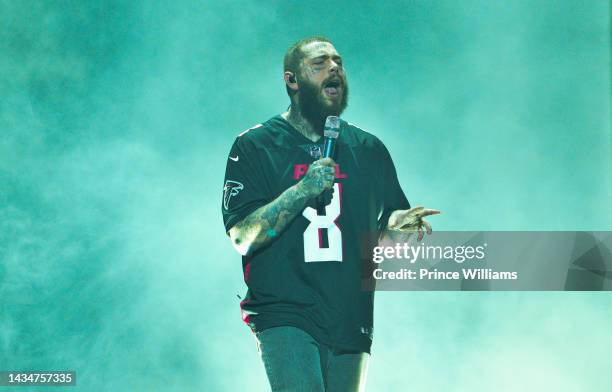 Post Malone performs onstage during his "Twelve Carat Toothache" tour at State Farm Arena on October 18, 2022 in Atlanta, Georgia.
