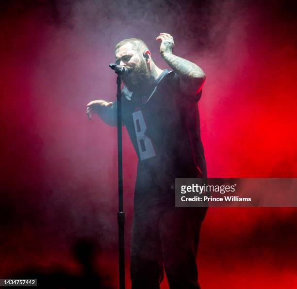 Post Malone performs onstage during his "Twelve Carat Toothache" tour at State Farm Arena on October 18, 2022 in Atlanta, Georgia.