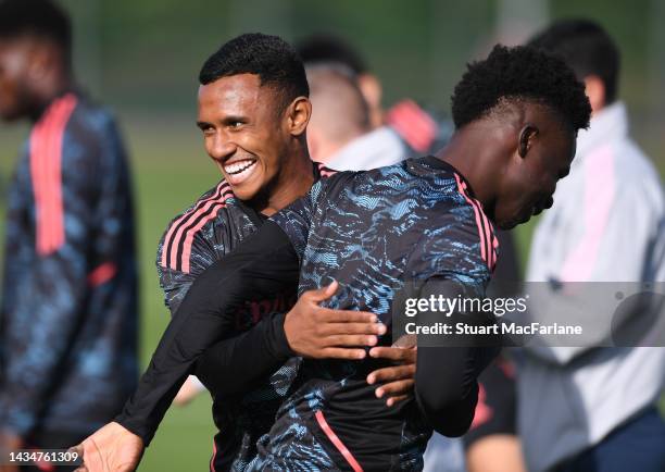 Marquinhos and Bukayo Saka of Arsenal during a training session at London Colney on October 19, 2022 in St Albans, England.