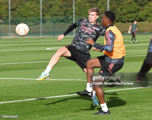 Rob Holding and Khayon Edwards of Arsenal during a training session at London Colney on October 19, 2022 in St Albans, England.