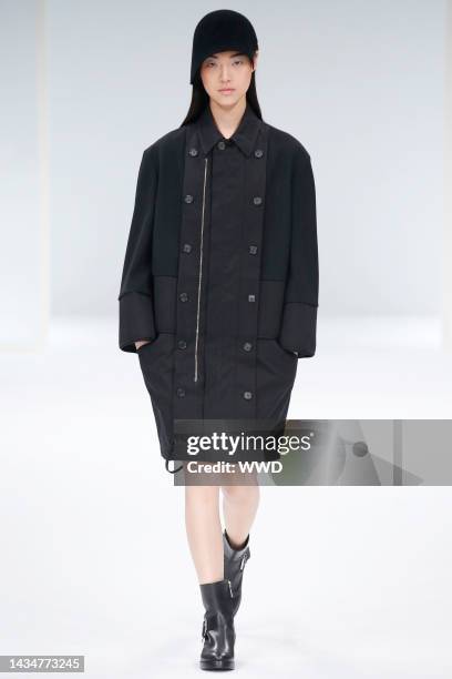 Model on the runway at Chalayan fall 2015 show at École nationale supérieure des Beaux-Arts.