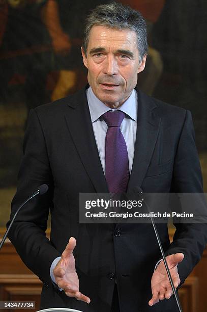 Secretary General Anders Fogh Rasmussen gestures as he attends a press conference along with Italian Prime Minister Mario Monti at Palazzo Chigi on...