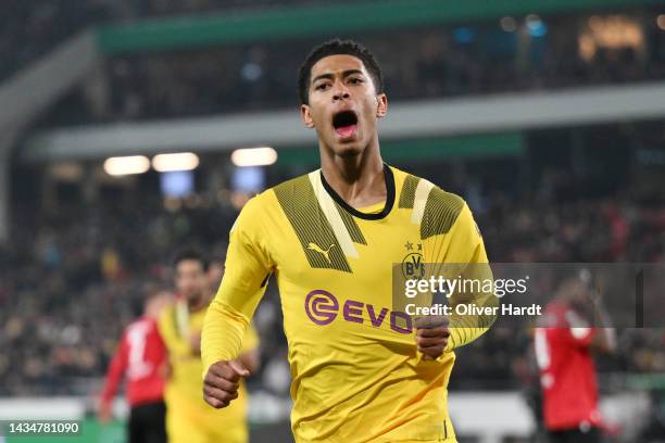 Jude Bellingham of Borussia Dortmund celebrates after scoring their team's second goal during the DFB Cup second round match between Hannover 96 and...