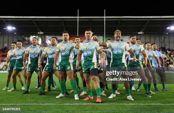 Players of the Cook Islands perform the Maori Ura during Rugby League World Cup 2021 Pool D match between Wales and Cook Islands at Leigh Sports...