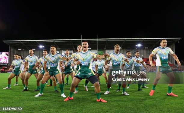 Players of the Cook Islands perform the Maori Ura during Rugby League World Cup 2021 Pool D match between Wales and Cook Islands at Leigh Sports...