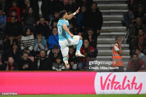 Che Adams of Southampton celebrates scoring their side's first goal during the Premier League match between AFC Bournemouth and Southampton FC at...