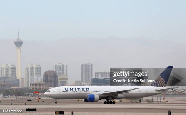 United Airlines plane taxis on the runway at Harry Reid International Airport on October 15, 2022 in Las Vegas, Nevada. United Airlines reported...