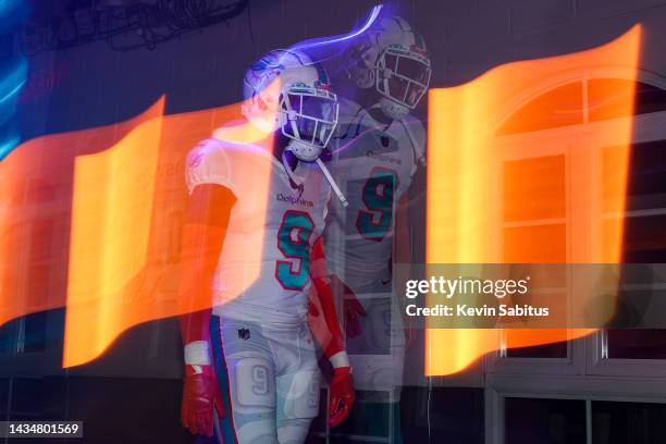 Noah Igbinoghene of the Miami Dolphins walks through the tunnel prior to an NFL football game against the Minnesota Vikings at Hard Rock Stadium on...