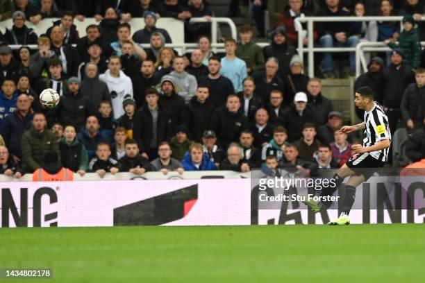 Miguel Almiron of Newcastle United scores their side's first goal during the Premier League match between Newcastle United and Everton FC at St....