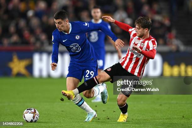 Kai Havertz of Chelsea is challenged by Mathias Jensen of Brentford during the Premier League match between Brentford FC and Chelsea FC at Brentford...