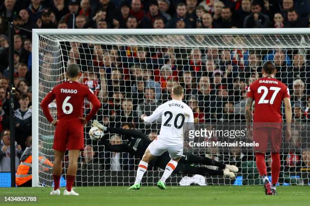 Jarrod Bowen of West Ham United has a penalty saved by Alisson Becker of Liverpool during the Premier League match between Liverpool FC and West Ham...