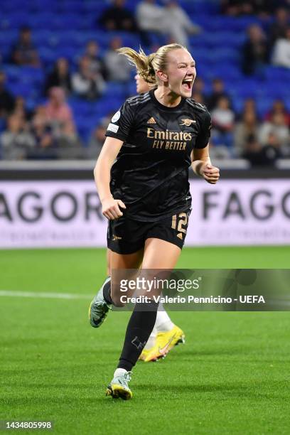 Frida Maanum of Arsenal celebrates after scoring their sides first goal during the UEFA Women's Champions League group C match between Olympique Lyon...