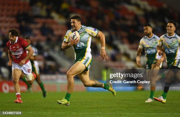 Anthony Gelling of Cook Islands goes over to score their sides first try during Rugby League World Cup 2021 Pool D match between Wales and Cook...