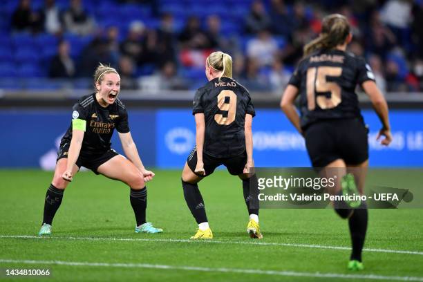 Beth Mead of Arsenal celebrates with team mates after scoring their sides third goal during the UEFA Women's Champions League group C match between...