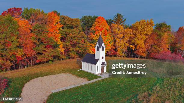 autumn colorful trees surround little chapel - little chapel stock pictures, royalty-free photos & images