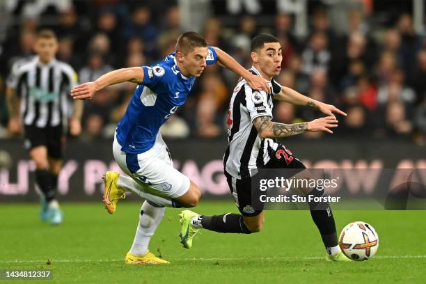 Vitaliy Mykolenko of Everton challenges Miguel Almiron of Newcastle United during the Premier League match between Newcastle United and Everton FC at...